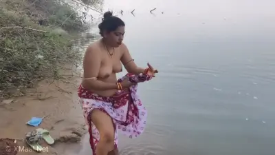 Indian Village Wife Bathing In The River In Outdoor Area